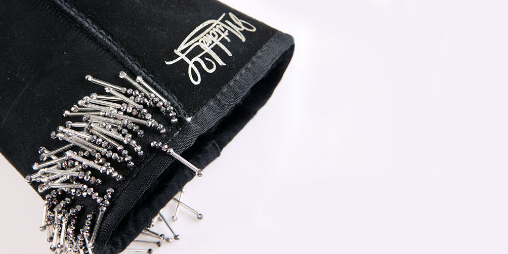 Beaded fringe detail across the boot cuff